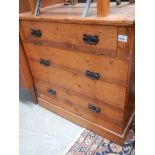 A pine chest with lift up lid.