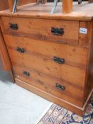A pine chest with lift up lid.
