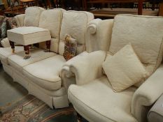 A 3 seater sofa, chair and stool.