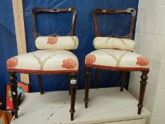 A pair of bedroom chairs.