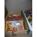 A box of Scooby Doo cards and magazines