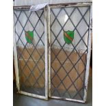 A pair of leaded and stained glass windows.