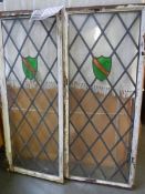 A pair of leaded and stained glass windows.