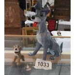 A large Wade Disney dog and a smaller example.
