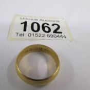 A 22ct gold wedding band, size N, 5.2 grams.