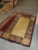 3 matching pattern rugs (2 black and red,