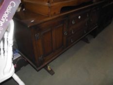 A rustic oak cottage style sideboard