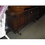 A rustic oak cottage style sideboard