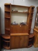 A 1970's teak effect 3 piece wall unit