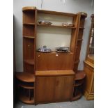 A 1970's teak effect 3 piece wall unit