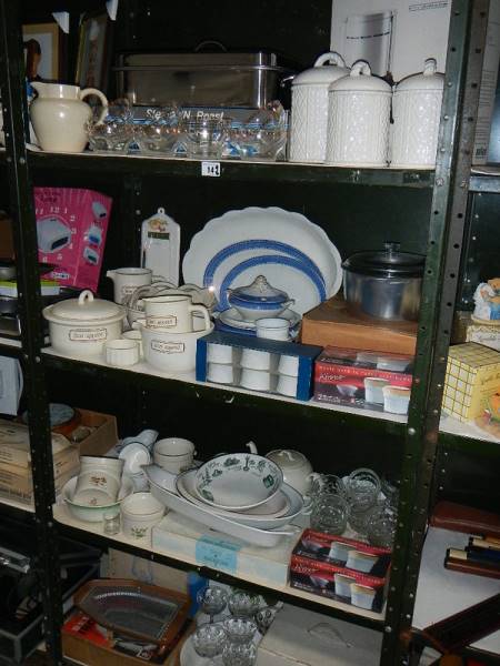 4 shelves of kitchen ware including some new items.