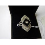 An 18ct onyx and diamond deco style ring in white gold, size N.