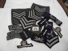 A quantity of military cloth badges