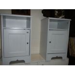 A pair of modern bedside cabinets.