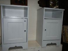 A pair of modern bedside cabinets.