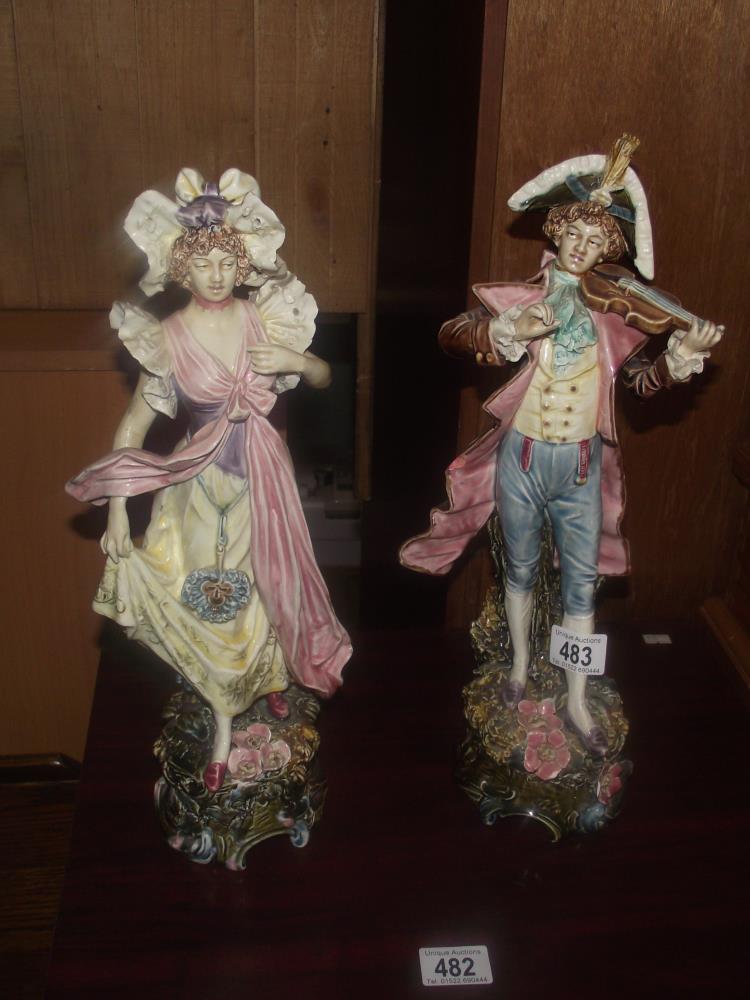 A pair of early 20th C continental porcelain figures