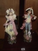 A pair of early 20th C continental porcelain figures