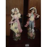 A pair of early 20th C continental porcelain figures