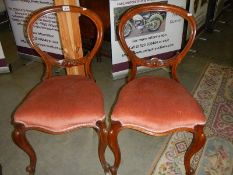 A pair of Victorian cabriole leg bedroom chairs.