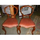 A pair of Victorian cabriole leg bedroom chairs.