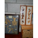 A framed wheat collage and 2 other framed items.