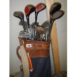 A set of old golf clubs.