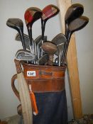 A set of old golf clubs.