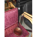 A Victorian copper bed warming pan