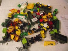 Box of toy tractors