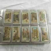 An album of cigarette cards including Wills, Player,