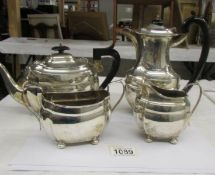 A 4 piece silver tea set comprising teapot, water jug, milk jug and sugar bowl.