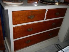 A 2 over 3 chest of drawers.