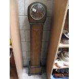 An Edwardian oak Grandmother clock