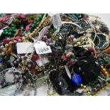 A large mixed lot of costume jewellery.