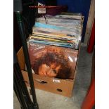 A box of LP records.