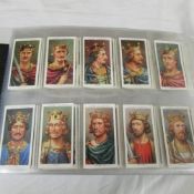 An album of cigarette cards including Wills, Player,