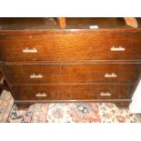 A 3 drawer oak chest.