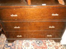 A 3 drawer oak chest.