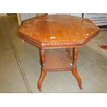 An exagonal mahogany occasional table.