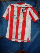 08/09 signed Lincoln city football shirt.