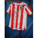 08/09 signed Lincoln city football shirt.