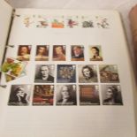An album of GB stamps including some mint and a good King George VI album with world stamps.