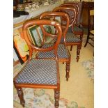 A good set of 4 Victorian balloon back dining chairs on turned legs.