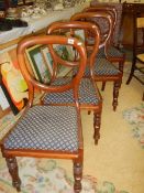 A good set of 4 Victorian balloon back dining chairs on turned legs.