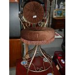 A 1960's filigree dressing stool.