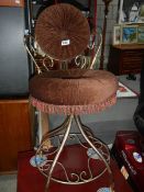 A 1960's filigree dressing stool.