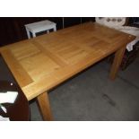 A modern solid oak dining table