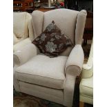 A wing arm chair.