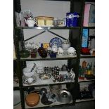 4 shelves of kitchen ware.