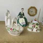 A Royal Doulton figurine 'A Lady from Williamsburg' HN2228, A Coalport figurine 'Our Special Day',